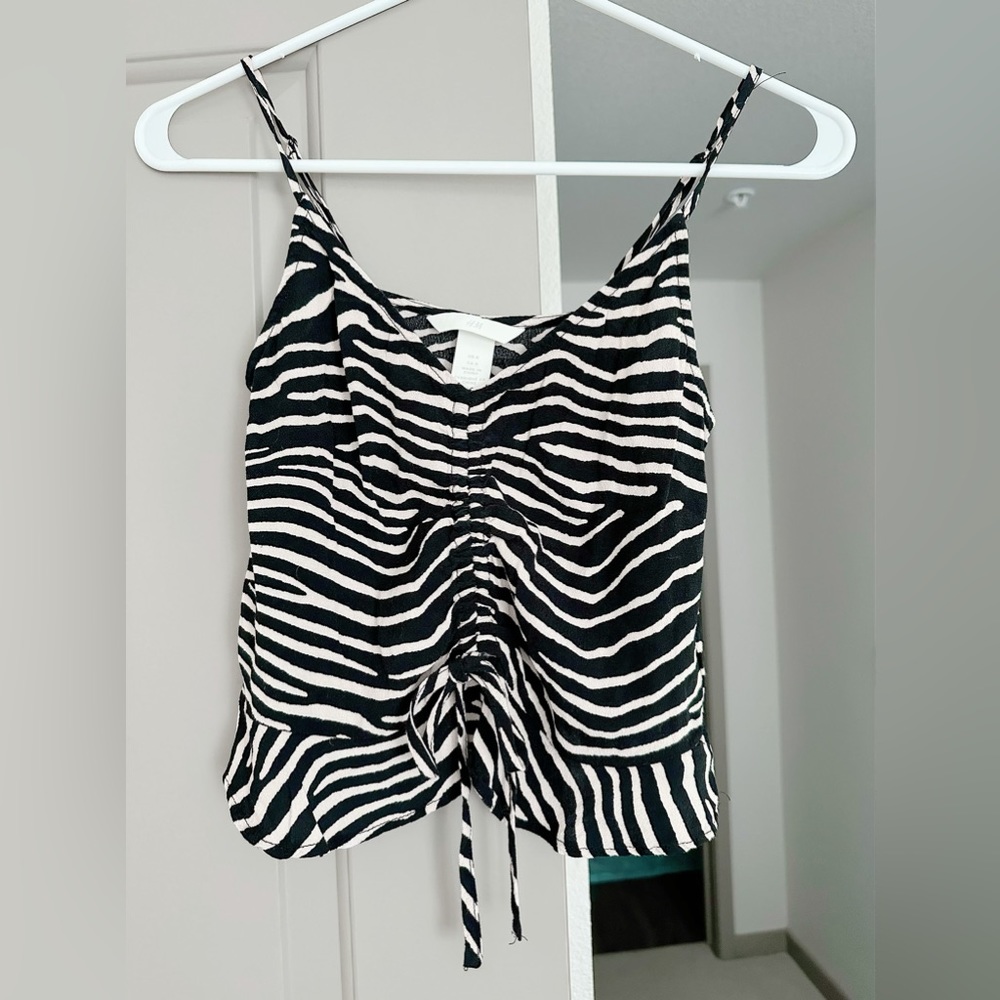 Gorgeous women’s spaghetti strap Zebra print blouse from H&M